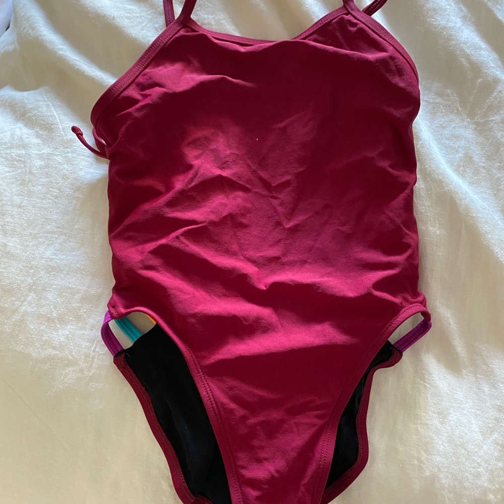 Jolyn maroon tie back onesie with multicolor slits